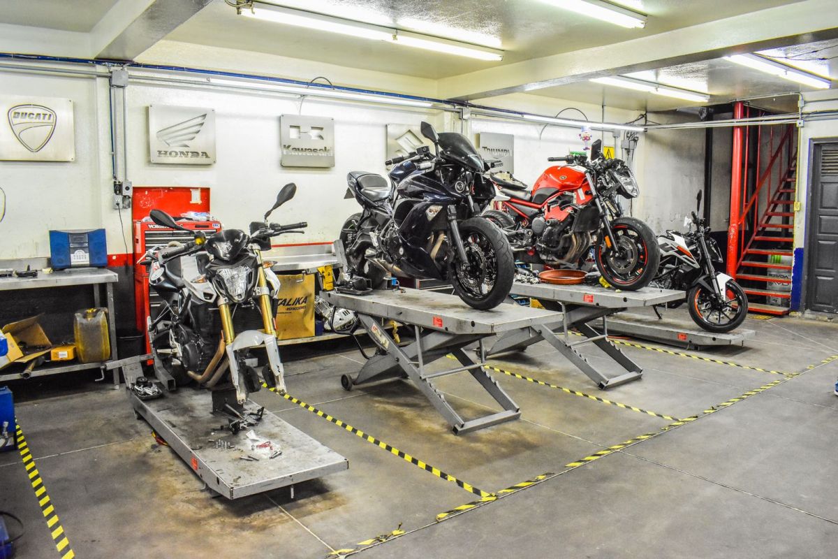 Winter service season has officially started. Four bikes in, zero space for my own. #GarageDays